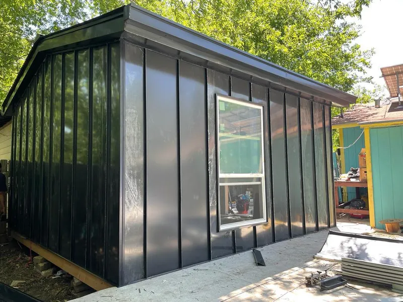 Black standing seam metal wall panels for Metal Roof Installation in Paxton